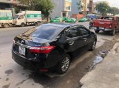 Chính chủ bán Toyota Corolla altis 2015, màu đen, xe nhập