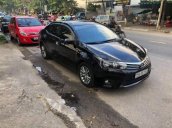 Chính chủ bán Toyota Corolla altis 2015, màu đen, xe nhập