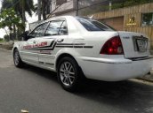 Cần bán xe Ford Laser Limited đời 2003, màu trắng, chạy rất êm ái