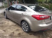 Cần bán Kia K3 năm sản xuất 2015, màu vàng, giá 450tr