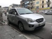 Cần bán lại xe Kia Carens MT năm 2011, màu bạc xe gia đình