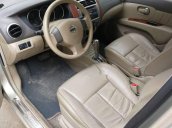 Cần bán xe Nissan Grand livina 1.8AT 2010, màu vàng xe gia đình giá cạnh tranh