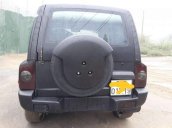 Gia đình bán Ssangyong Korando năm 2003, màu đen, nhập khẩu