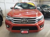 (Hãng) bán xe Toyota Hilux 2.8G 4x4 AT sản xuất 2016, màu cam, nhập khẩu