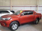 (Hãng) bán xe Toyota Hilux 2.8G 4x4 AT sản xuất 2016, màu cam, nhập khẩu