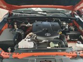 (Hãng) bán xe Toyota Hilux 2.8G 4x4 AT sản xuất 2016, màu cam, nhập khẩu