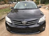 Cần bán gấp Toyota Corolla Altis 1.8 AT năm 2011, màu đen còn mới