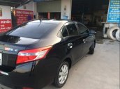 Cần bán xe Toyota Vios E MT đời 2016, màu đen  