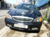 Cần bán xe Daewoo Magnus năm sản xuất 2004, màu đen, máy êm