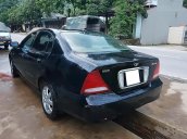 Bán Daewoo Magnus 2.0 MT năm sản xuất 2002, màu đen số sàn