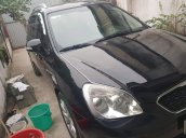 Cần bán xe Kia Carens đời 2011, 2.0 AT, màu đen, giá 399tr