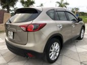 Bán ô tô Mazda CX 5 sản xuất 2014, màu ghi vàng