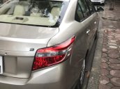 Cần bán Toyota Vios E sản xuất năm 2015, màu ghi vàng