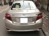 Cần bán Toyota Vios E sản xuất năm 2015, màu ghi vàng