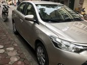 Cần bán Toyota Vios E sản xuất năm 2015, màu ghi vàng