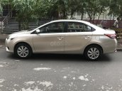 Cần bán Toyota Vios E sản xuất năm 2015, màu ghi vàng