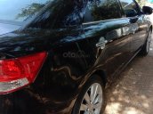 Cần bán Kia Forte 2010, màu đen xe gia đình