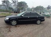 Cần bán gấp Ford Laser sản xuất 2004, màu đen xe gia đình, giá chỉ 160 triệu