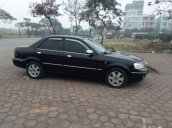 Cần bán gấp Ford Laser sản xuất 2004, màu đen xe gia đình, giá chỉ 160 triệu