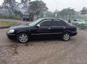 Bán Ford Laser Ghia 2004, màu đen như mới, giá tốt