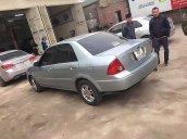 Cần bán lại xe Ford Laser LXi 1.6 MT năm 2004, màu bạc chính chủ 