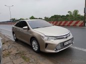 Bán xe Camry 2.0E sản xuất năm 2016, số tự động, máy xăng, màu vàng cát, nội thất màu kem, đã đi 45000 km