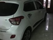 Cần bán Hyundai Grand i10 1.2 AT đời 2016, màu trắng, xe nhập chính chủ