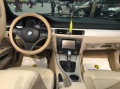 Bán ô tô BMW 320i Sport mui trần model 2010, màu trắng, xe nhập