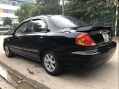 Bán ô tô Kia Spectra 2004, màu đen, xe nhập