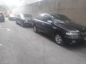 Bán Mazda 323 sx 2000, màu đen chính chủ