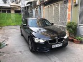 Bán BMW 320i sx 2016 đăng ký 2017, số tự động, máy xăng, màu đen nội thất kem sang trọng