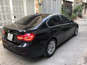 Bán BMW 320i sx 2016 đăng ký 2017, số tự động, máy xăng, màu đen nội thất kem sang trọng