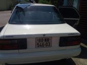 Cần bán xe Toyota Corolla MT năm 1990, màu trắng, nhập khẩu, hồ sơ cầm tay, sang tên dễ dàng