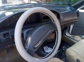 Cần bán xe Toyota Corolla MT năm 1990, màu trắng, nhập khẩu, hồ sơ cầm tay, sang tên dễ dàng