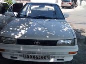 Cần bán xe Toyota Corolla MT năm 1990, màu trắng, nhập khẩu, hồ sơ cầm tay, sang tên dễ dàng