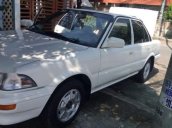 Cần bán xe Toyota Corolla MT năm 1990, màu trắng, nhập khẩu, hồ sơ cầm tay, sang tên dễ dàng