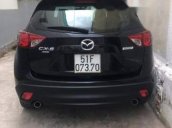 Bán xe Mazda CX 5 2.0 AT AWD 2014, màu đen còn mới, giá 725tr