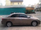 Cần bán lại xe Toyota Corolla altis năm 2009, màu vàng xe gia đình