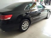 Cần bán gấp Toyota Camry 2.4G đời 2011, màu đen xe gia đình, giá tốt