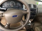 Bán xe Ford Laser GHIA 1.8 AT năm sản xuất 2004, màu xanh 