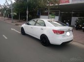 Cần bán xe Kia Forte 1.6AT màu trắng 2010, xe gia đình ít sử dụng còn rất mới