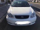 Bán Toyota Corolla Altis sản xuất 2003, màu trắng, nhập khẩu, xe không bị cấn móp, va chạm hay taxi