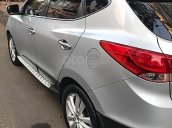 Bán xe Hyundai Tucson 2.0 AT 4WD năm 2010, màu bạc, nhập khẩu 