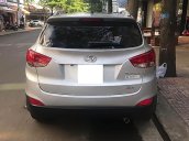 Bán xe Hyundai Tucson 2.0 AT 4WD năm 2010, màu bạc, nhập khẩu 