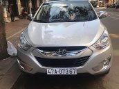 Bán xe Hyundai Tucson 2.0 AT 4WD năm 2010, màu bạc, nhập khẩu 