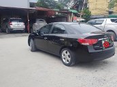 Cần bán gấp Kia Cerato 1.6 AT đời 2010, màu đen, xe nhập 