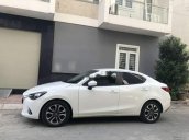 Cần bán Mazda 2 sản xuất 2016, màu trắng, xe cũ