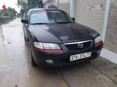 Cần bán Mazda 626 năm sản xuất 2003, màu đen