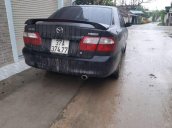 Cần bán Mazda 626 năm sản xuất 2003, màu đen