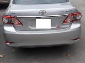 Cần bán xe Toyota Corolla Altis 1.8 đời 2013, màu bạc chính chủ